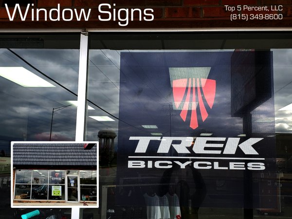 Custom window signs for businesses throughout Joliet Illinois